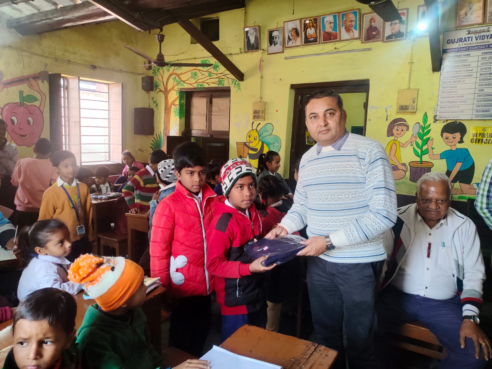 Read more about the article Distribution of woolen sweater to the students of Gujrati Free Primary School